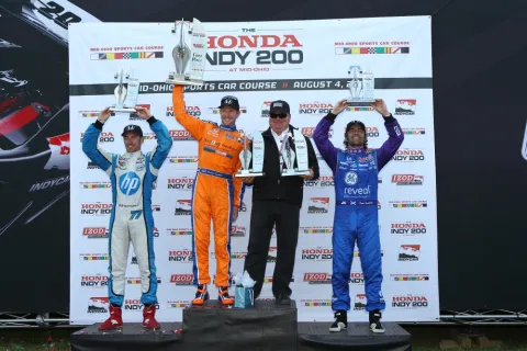 Das Podium: Simon Pagenaud, Charlie Kimball, Chip Ganassi und Dario Franchitti